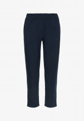 Tommy Hilfiger TAPERED FIT Tracksuit bottoms desert sky TAPERED FIT Низ спортивного костюма небо пустыни